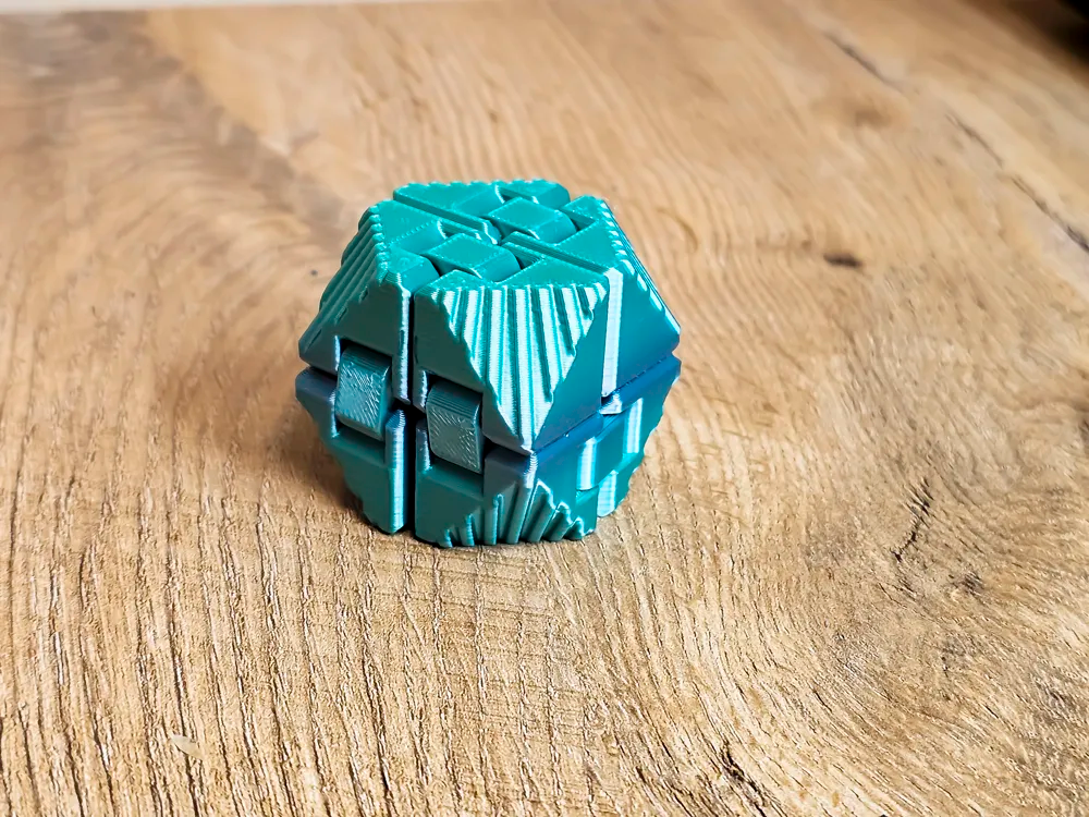 3d‑printed geometric puzzle cube (random colour) 3d‑printed geometric puzzle cube (random colour)